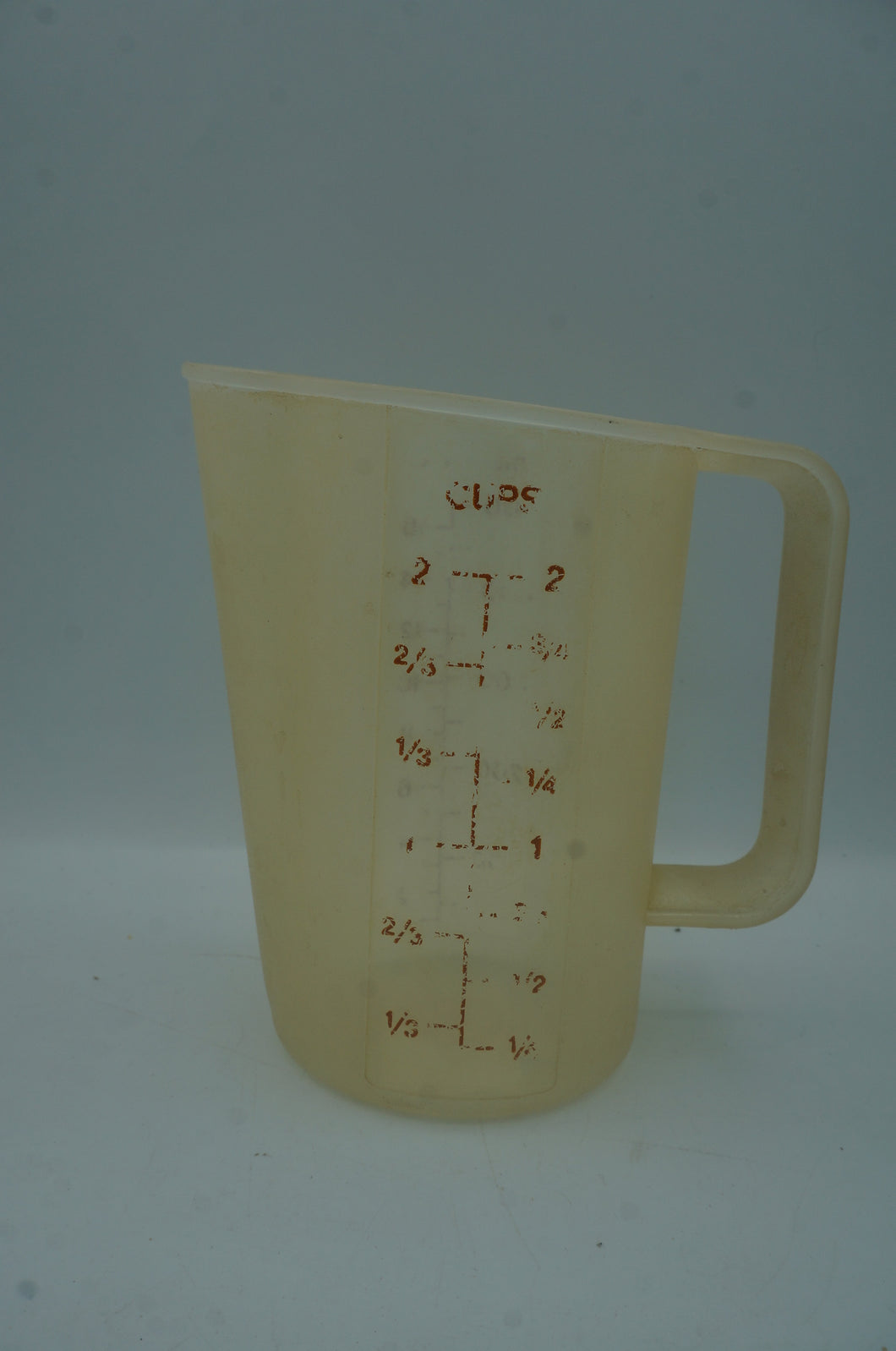 vintage Tupperware measuring cup- ohiohippies.com