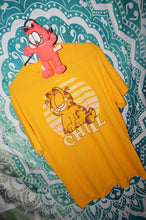 Load image into Gallery viewer, Garfield shirt with plush doll  size large - Caliculturesmokeshop.com
